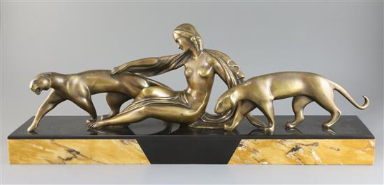 Michel Decoux (1837-1924). An Art Deco bronze group of a reclining woman with two panthers, 22.75in.